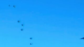 Watch the parachute drop from the warplane