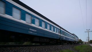 Passenger train passing by slowly - adalinetv