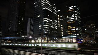 Full shot of a train in Tokyo night - adalinetv