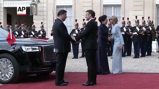 Chinese President Xi Jinping and wife in Paris for state dinner.