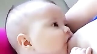Baby being breastfed by his favorite mom????????