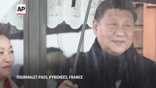 China's Xi visits Pyrenees mountains with Macron.