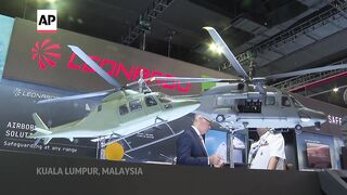 Protests in Malaysia over presence at defense show of Western firms supplying weapons to Israel.