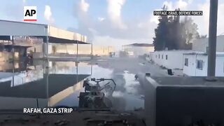 Israeli forces take control of the Gaza side of the Rafah crossing with Egypt.