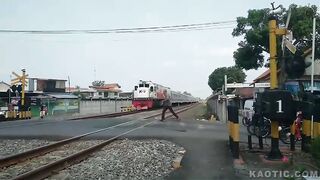 Old Man Catches His Train In Indonesia