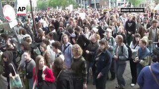 Pro-Palestinian march by University of Amsterdam students, staff after camp dismantled.