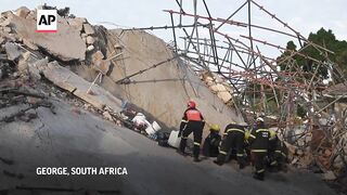 Rescuers work in the rubble after deadly building collapse in South Africa.