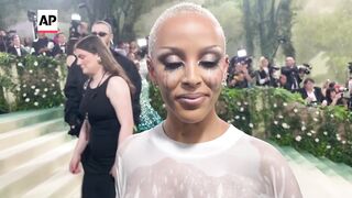 Doja Cat explains her Met Gala look.