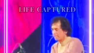 Ustad Zakir Hossain playing tabla.