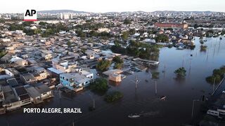 Authorities in southern Brazil rush to rescue survivors of massive flooding.