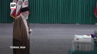 Khamenei votes as Iran begins run-off parliamentary elections.