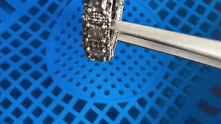 Diamond ring being cleaned in ultrasonic jewelry cleaner
