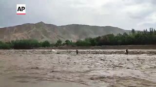 At least 50 people dead after flash floods in northern Afghanistan.