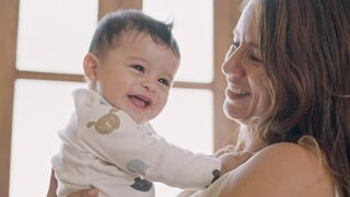 Close up to the face of a small baby with big eyes - adalinetv