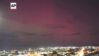 Solar storm turns the sky purple in Chile's southernmost city.