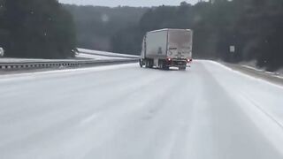 Tractor-trailer crashes in Alabama during winter storm