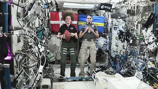 NASA Astronauts aboard space station huddle up for super bowl