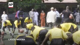 Prince Harry shows basketball prowess at event in Nigerian capital.