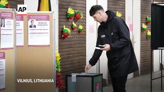 Lithuanians cast their votes in presidential election.