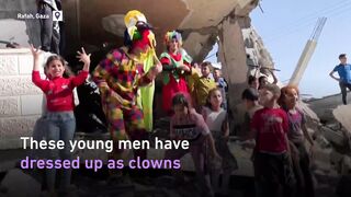 Palestinians dress up as clowns to entertain children who missed out on Eid celebrations