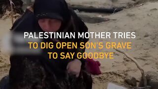 Palestinian mother tries to dig open her son’s grave to see him
