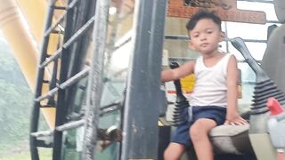 Son with excavator