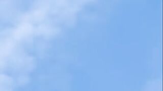 couple takes video of what seems to be a person falling without a parachute