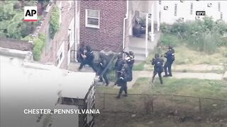 Delaware police exchange gunfire with woman in police chase through 2 states.