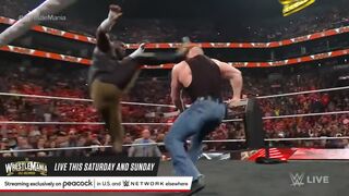Omos hits a devastating kick on Brock Lesnar
