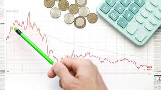 A businessman pointing a bad inversion - adalinetv