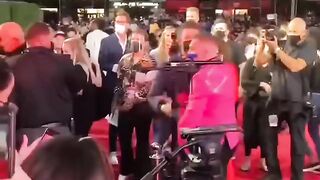 Conor McGregor threw a drink at Machine Gun Kelly on the VMAs red carpet.