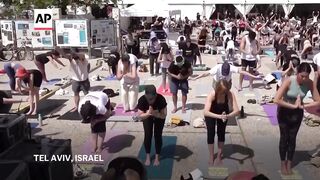 Friends and family of Israeli hostage Carmel Gat hold yoga practice to mark her 40th birthday.