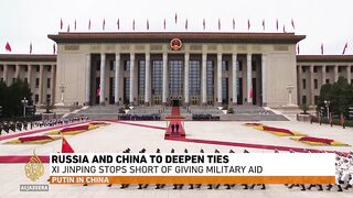 Russia and China to deepen ties_ XI Jinping stops short of giving military aid.