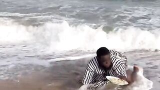 The man eating in sea beach