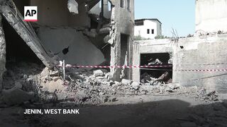 Building in ruins in aftermath of Israeli strike targeting militants in West Bank.