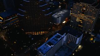 Movement in a city at night in an aerial shot - adalinetv