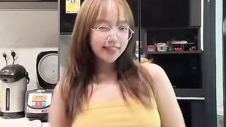Korean Girl dancing in a Kitchen