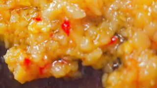 Tender and flavorful, the braised pig's foot is infused with a rich garlic sauce...