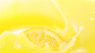 Slice of oranges falling into the juice - adalinetv