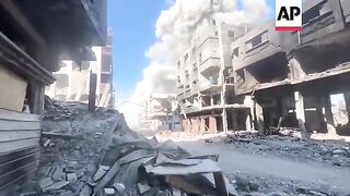Aftermath of strike that hit a residential building in the northern Gaza Strip