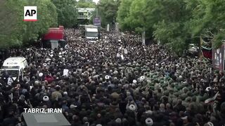 Mourners begin days of funerals for Iran’s president and others killed in helicopter crash.