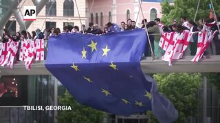 Students lead protests in Tbilisi, Georgia, against divisive law.