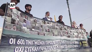 Protest in Athens as trial begins on last year's deadly migrant boat sinking.
