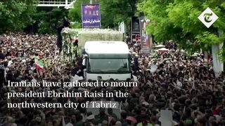 Thousands attend funeral procession for Iran's deceased president Ebrahim Raisi