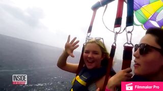 Vacationers Spot Sharks in Water While Parasailing