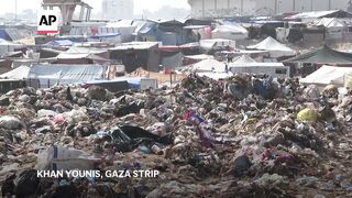 Displaced Palestinians in Muwasi camp face health risks as garbage piles up