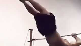 Jock on the horizontal bars