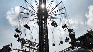 "Rollercoaster Revelry: Happy Times at the Theme Park" 2