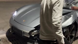 To men destroying Ferrari