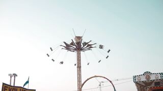 "Laughter and Thrills: A Fun Day at the Amusement Park"